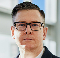 Alexander Hughes, toimitusjohtaja kryptovaluuttakauppaa harjoittavassa yrityksessä, muotokuva